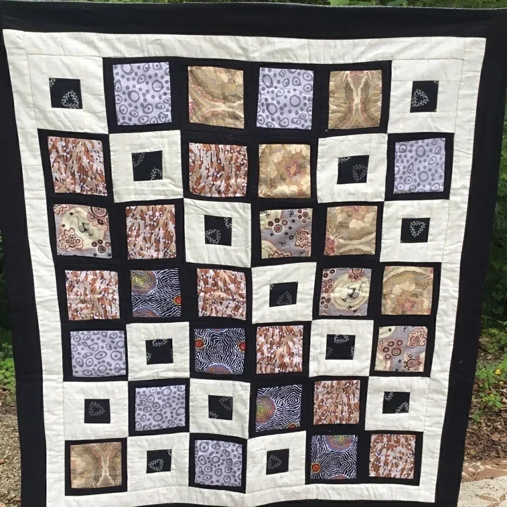 NWT. Hand Crafted Aboriginal Prints Quilt